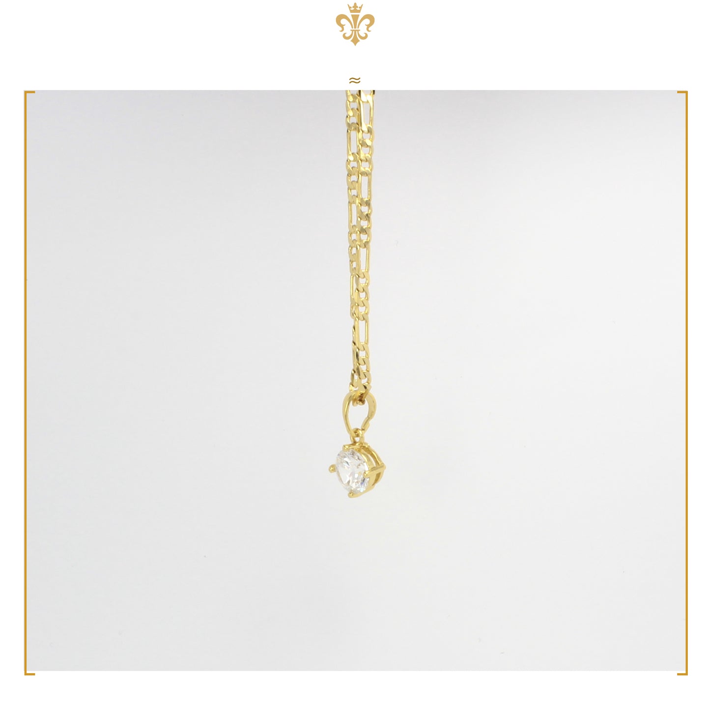 cadena tipo figaro con dije solitario de cristal diamante en oro laminado 24k para mujer