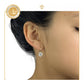 Aretes huggies dorados con colgantes de cristal en oro laminado 18k